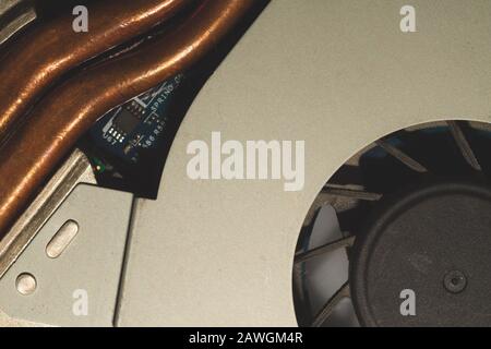 Cooling system of notebook close up. computer cooling fan with dust. computer technology background Stock Photo