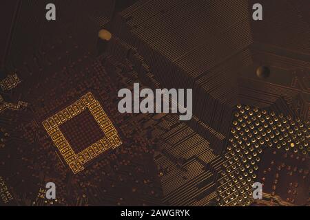 Processor pins macro. computer motherboard close up. cpu pins on a circuit board. micro elements of computer central processor unit. modern technologi Stock Photo
