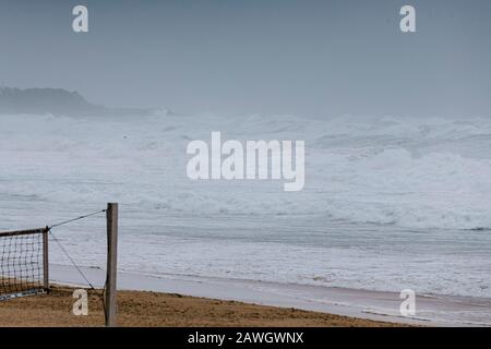 Manly, NSW, Australia. 9th Feb, 2020. Stormy sea. Heavy rainfall causes flash flooding across Sydney. A coastal trough off the NSW coast is being monitored for East Coast Low development over the next 24 hours. This system will move only slowly southwards and bring increasingly widespread and prolonged periods of rain to the hunter and southern NSW coast. High tides forecast on Sunday through to Tuesday may exacerbate flood conditions in low lying coastal areas. A Severe Weather Warning has been issued for the Metropolitan, Illawarra, South Coast and parts of Northern Rivers, Mid North Coast, Stock Photo