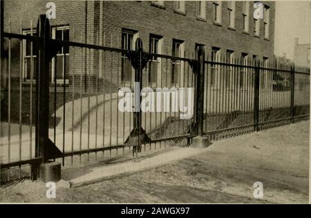 Property protection and ornamentation : . An Ornamental Factory Entrance to the plant of the Harlan & Hollingsworth Corp., Wilmington, Del.. Drive Gates protecting the Ferris Shoe Co., Cambria is: Tulip Sts. No cross braces to make themclimbable. For details ot fence see page 2S 14 m FACTORIES IIIIIIIIIIIIIIIIIIIIIINIIIIIINIIIIIIIIIIIIIIIIIIIIIIIINIINIIIIIIIIIIIIIIIIIIIIIIIIIIIIIIIIIIIIIIIII III!,/ Illllllll II:: I inillllllllllimilllllllllllllllllllim IlllllimilllllllllllllUimillllllllllllllllllllllllllimilllllUllllllimuillllllllU^ Stock Photo