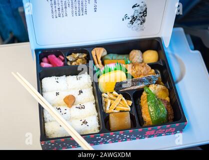 Special Hello Kitty ekiben (train bento, Hello Kitty bento box lunch)  aboard the Hello Kitty shinkansen (Hello Kitty bullet train). Okayama,  Japan Stock Photo - Alamy