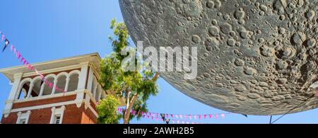 Museum of the Moon art installation by artist Luke Jerram 7 metre diameter Moon suspended over Perth Cultural Centre Northbridge Perth WA Australia. Stock Photo