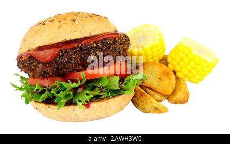 Peppered beef grill steak burger with fresh salad, potato wedges and corn on the cob isolated on a white background Stock Photo