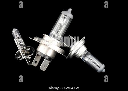 Group of spare car light bulbs isolated on a black background Stock Photo