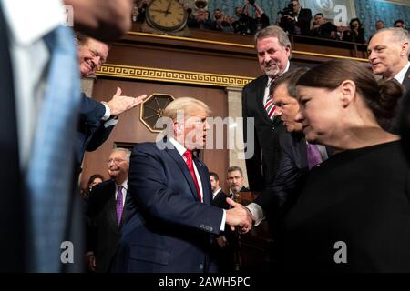 Washington, United States Of America. 04th Feb, 2020. President Donald J. Trump arrives to the House Chamber and is greeted by members of Congress prior to delivering his State of the Union address Tuesday, Feb. 4, 2020, at the United States Capitol in Washington, DC People: President Donald Trump Credit: Storms Media Group/Alamy Live News Stock Photo
