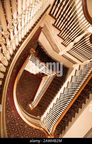 The spiral-ish staircase in the Historic Stanley Hotel in Estes Park, Colorado. A haunted hotel that inspired Stephen King's 'The Shining.' Stock Photo