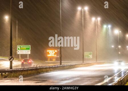 Flintshire, North Wales, UK. UK Weather: Sunday 9th February 2020, severe weather today with a Met Office Amber Warning for Storm Ciara now hitting North Wales with current conditions on the A55 passing through Halkyn  © DGDImages/AlamyNews Stock Photo