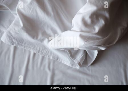 Rippled cotton fabric bedding. Top view Stock Photo