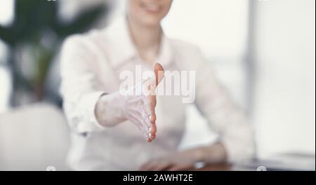 Unrecognizable Lady Stretching Hand For Handshake Sitting In Office, Panorama Stock Photo