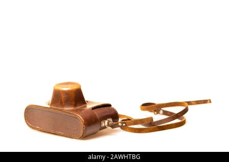 Old camera in brown leather case Stock Photo