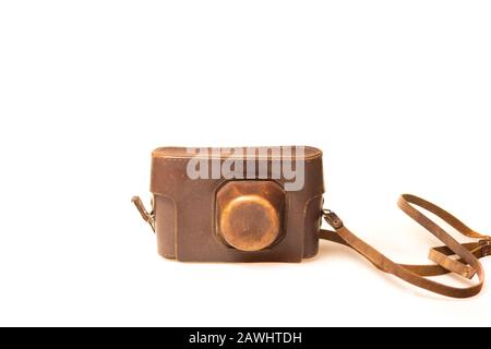 Old camera in brown leather case Stock Photo
