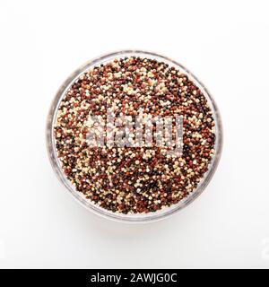 Portion of quinoa seeds mix on white background Stock Photo