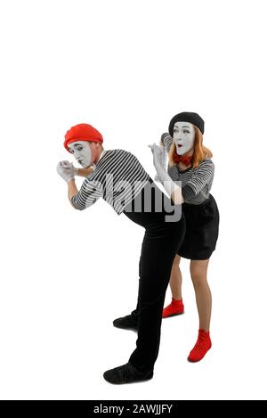 Pantomime sketch of two mimes. Man and woman as mime artists Stock Photo