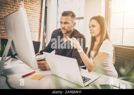Developing programming and coding technologies. Website design. Programmer working in a software develop company office. Stock Photo