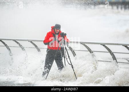 Blackpool, Lancashire. 9th Feb, 2020. The third named storm of the season, the worst since 2013 arrives in Blackpool. Large waves and debris thrown on coastal roads, seafronts and properties present a risk to life. Wet and windy weather, with winds as strong as 60mph going up to 70mph in more exposed areas. Credit: MediaWorldImages/Alamy Live News Stock Photo