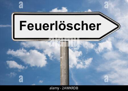 Detail photo of a signpost with the inscription ���ܱ����ö�������� (Fire extinguisher) Stock Photo