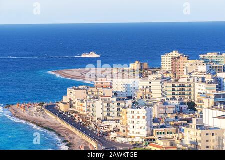 View of Aegean Sea round city of Rhodes, small ship on sea (Rhodes, Greece) Stock Photo