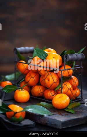 Fresh ripe tangerines with leaves Stock Photo