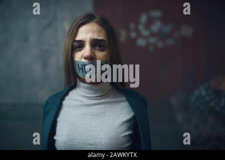 Victim with her mouth taped shut, kidnapping Stock Photo