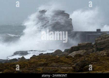 Portland Bill, Dorset, UK.  9th February 2020. UK Weather.  Rough seas whipped up by Storm Ciara smash against Pulpit Rock at Portland Bill in Dorset.  Picture Credit: Graham Hunt/Alamy Live News