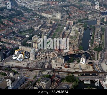 Rotterdam, Holland, August 8 - 1988: Historical aerial photo of the Blaak with cube houses and Blaaktoren in Rotterdam, Holland Stock Photo