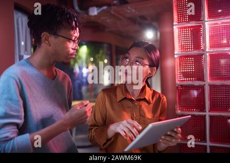 Waist up portrait of contemporary business team working on project in futuristic office interior, copy space Stock Photo