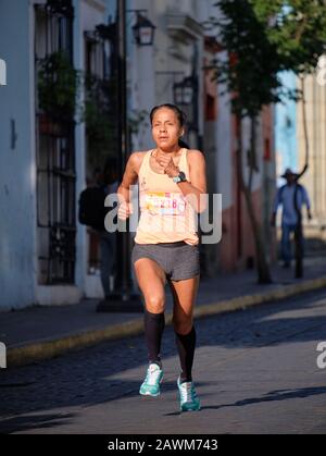 Oaxaca de Juarez, Mexico. February 9th, 2020. Luisa Peña Vásquez, Master female winner in the 10km race, one of the Runners in the second annual Huizache Athletic Race through the streets of the old colonial part of the capital. The event includes 5km, 10km  with an elite component from around the country, as well as general participation from locals. Credit: meanderingemu/Alamy Live News Stock Photo