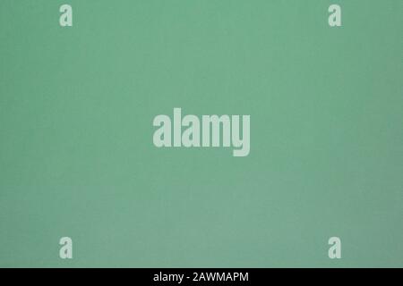 Textured Paper Background. Green  textured paper background. Stock Photo