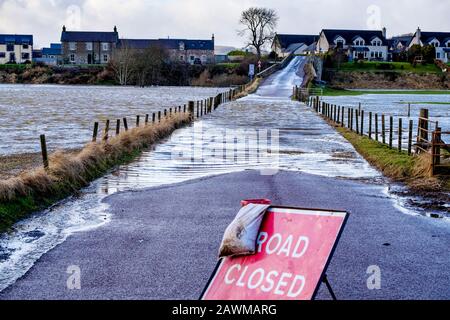 Storm Ciara causes the River Clyde to burst its banks in South Lanarkshire Scotland causing wide spread flooding on roads and fields. Stock Photo