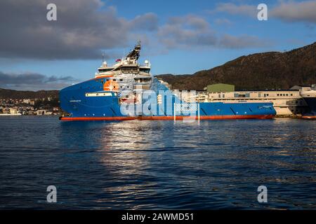 AHTS anchor handling multi-purpose offshore support vessel Horizon Arctic at Skoltegrunnskaien quay, Bergen, Norway. At sunset Stock Photo