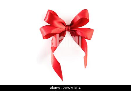 Red ribbon bow isolated on white background with clipping path Stock Photo