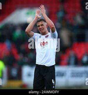 9th February 2020; Broadwood Stadium, Cumbernauld, North Lanarkshire, Scotland; Scottish Cup Football, Clyde versus Celtic; Tom Lang of Clyde applauds the Clyde fans after the match Stock Photo