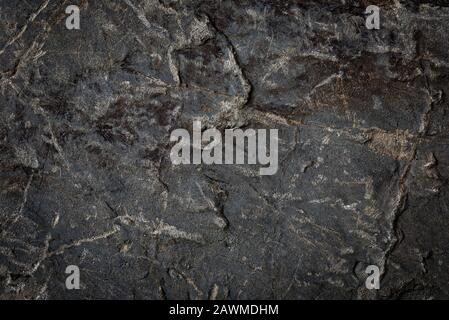 Abstract background of natural dark grey stone or rock (high details) Stock Photo
