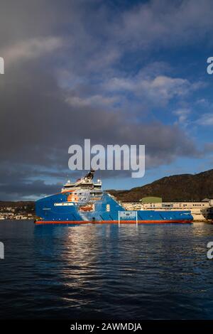 AHTS anchor handling multi-purpose offshore support vessel Horizon Arctic at Skoltegrunnskaien quay, Bergen, Norway. At sunset Stock Photo