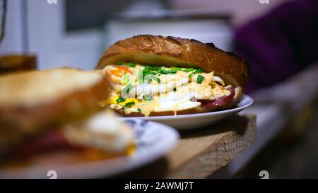 sandwiches with egg,cheese and green onion. homemade hot sandwich. Stock Photo