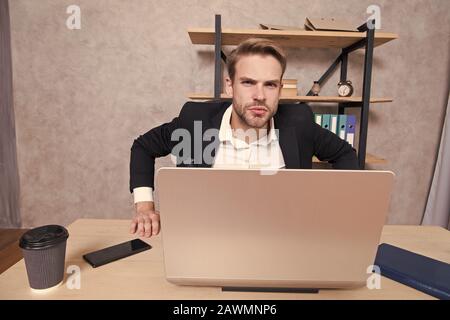 Firing employees. Serious boss picky looking at camera. Boss with ...