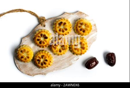 Cookies with Arabic dates isolated on white Stock Photo
