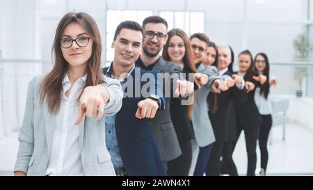 large group of young business people are pointing at you Stock Photo