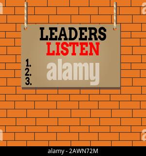 Text sign showing Leaders Listen. Business photo text knowledge are not gained by talking but by listening Wooden board wood rectangle shape empty fra Stock Photo