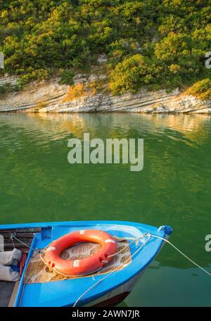 A boat on one of the two rivers that run towards the Black Sea coast in Agva, in the Sile district of Istanbul province, Turkey. Focus on foreground Stock Photo