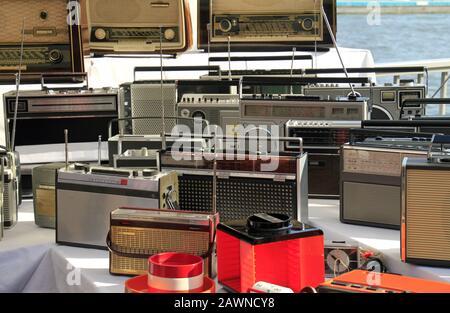 Closeup shot of old radios next to each other on a ship Stock Photo