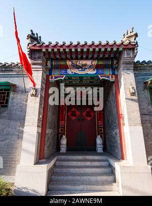 Traditional old style richly decorated house in street in Xi Cheng Hutong District, Beijing, China, Asia Stock Photo