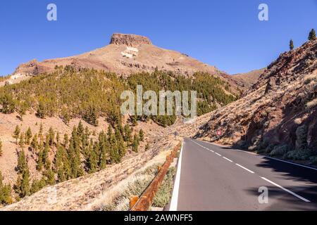 Road and volcanic rock near Vilaflor, Tenerife, Canary Islands Stock Photo