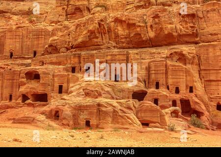 Closeup of Urn tomb, the Court, located in the side of the mountain known as al-Khubta, above Wadi Musa in Petra, Red Rose city, in Jordan. Stock Photo