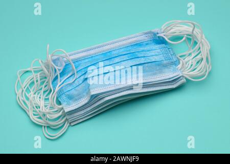 Stack of medical mask for protection against influenza virus. Stock Photo