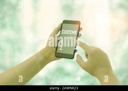 Handwriting text writing Customs. Conceptual photo Official department administers collects duties on imported goods Stock Photo