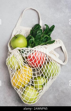 Zero Waste Eco Mesh Shopping Bag With Fruits And Greens. Environment Protection, Eco Friendly Lifestyle Concept Stock Photo