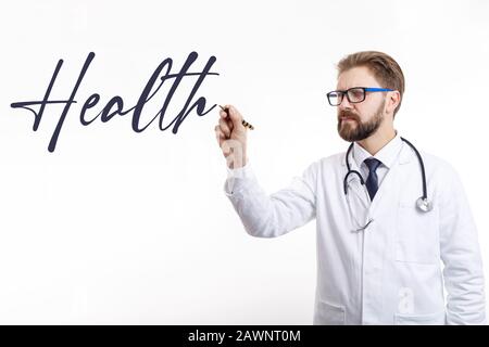 Pensive Doctor Writing the Health Word in Air Stock Photo