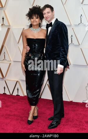 Zazie Beetz and David Rysdahl walking on the red carpet at the 92nd Annual Academy Awards held at the Dolby Theatre in Hollywood, California on Feb. 9, 2020. (Photo by Anthony Behar/Sipa USA) Stock Photo