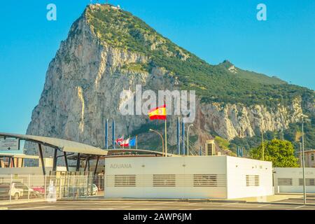 Gibraltar, United Kingdom - April 24, 2016: Gibraltar border, between Spain and England, bay view from Spanish territory in Spain. Flags of Europe Stock Photo